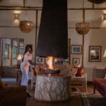 volcanoes safaris bwindi lodge lounge fireplace