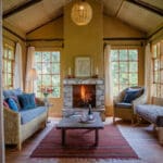 volcanoes safaris mount gahinga lodge banda sitting room