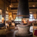 Virunga Lodge 14 volcanoes safaris virunga lodge lounge fireplace
