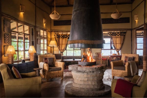 volcanoes safaris virunga lodge lounge fireplace