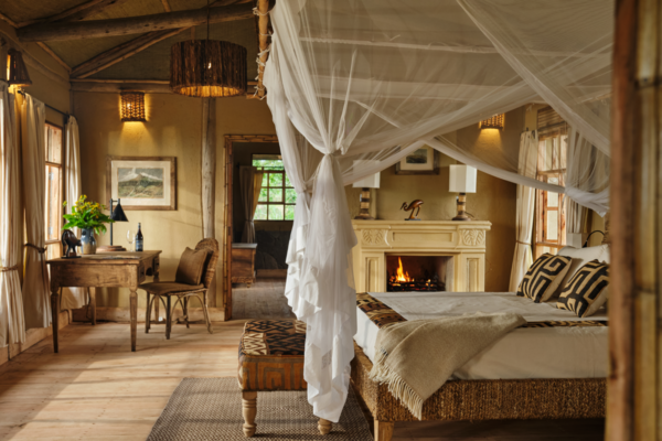 Press 1 Volcanoes Safaris Kibale Lodge Deluxe Bedroom